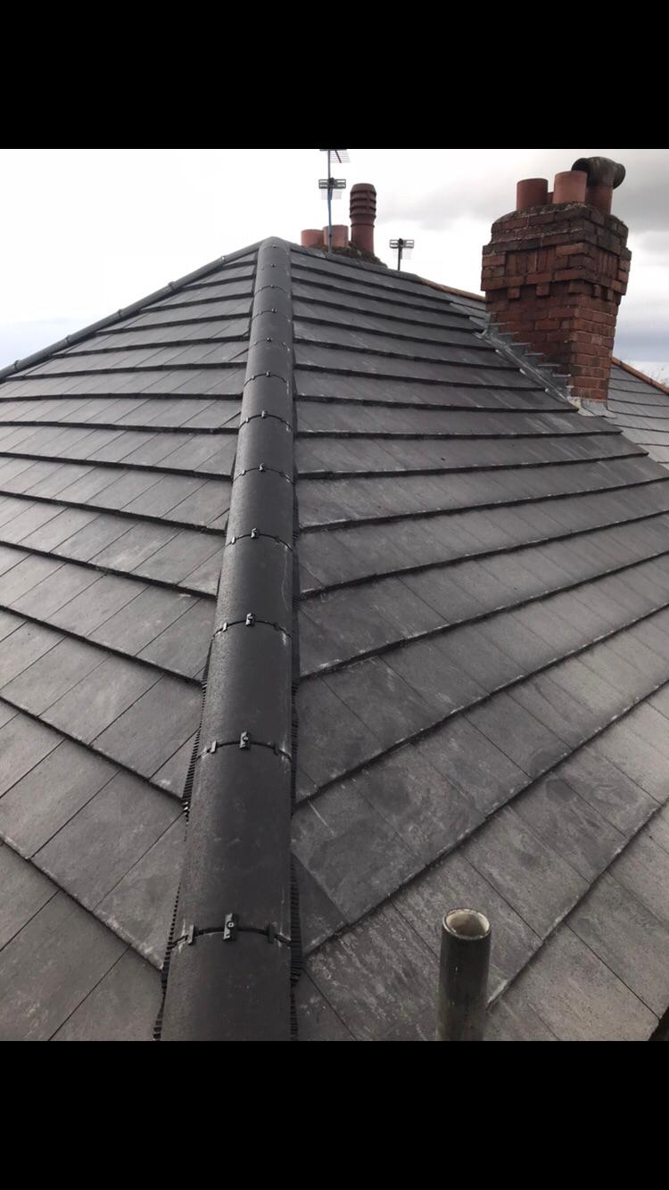 An image showing a corner profile of a slate roofing job carried out by Pedmore Roofing Services