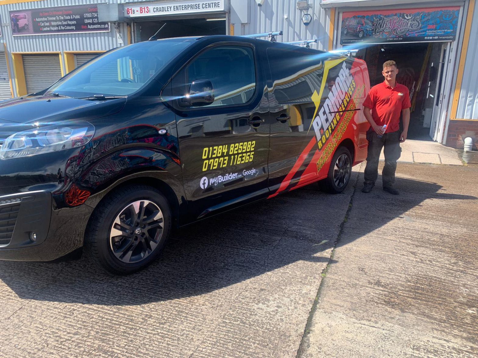 The owner of Pedmore Roofing Services standing next to a freshly wrapped company van