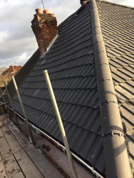 An example of new roof tiling work carried out. Taken from scaffolding at the level of the roof