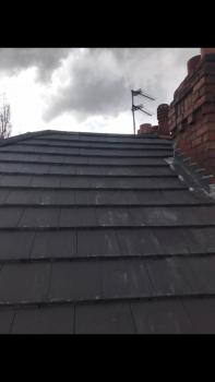 Grey roof slate work carried out on a property