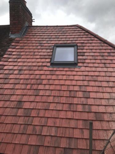 Another example of a roof tiling job with a built in Velux window